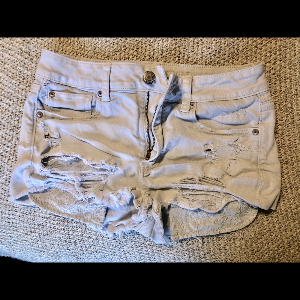 White distressed American eagle cut off shorts